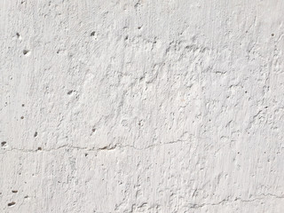 white abstract stucco background. smudged shabby weathered concrete plaster backdrop. copyspace concept