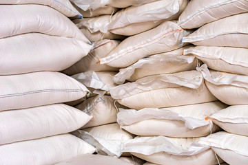Many sugar bags stacked at modern winery