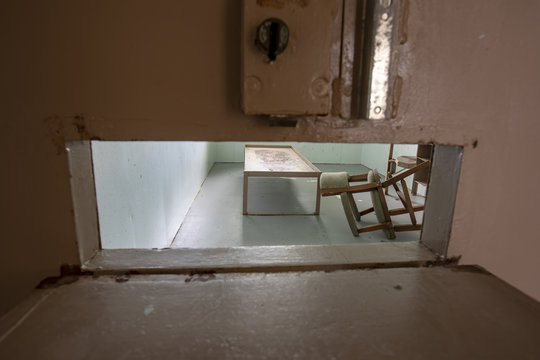 Solitary confinement cell through door slat