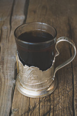 Tea in the Russian cup holder.