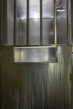 Metal door on shower stall in prison