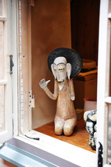 ceramic figure in the window shop