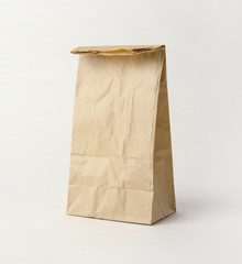Blank brown paper bag for mockup template advertising and branding background.