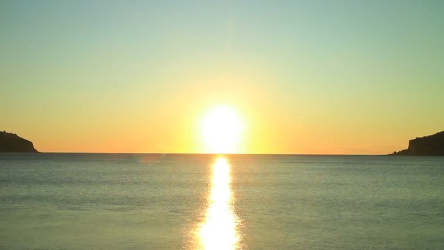 Scenic sunset over sea surface. Greece Peloponnese Lakonias Neo Itylo. Time lapse