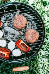 ingredients for burger are grilled