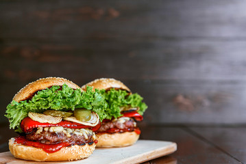 delicious homemade burger with juicy meatball and grilled vegetables