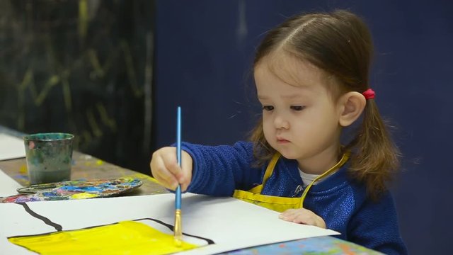 children, the child draw a still life.