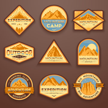 Set of nine mountain travel emblems. Camping outdoor adventure emblems, badges and logo patches. Mountain tourism, hiking. Forest camp labels in vintage style