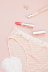 Flat lay set of female panties and accessories