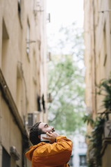 Bearded man with smartphone on a street in the city of Madrid