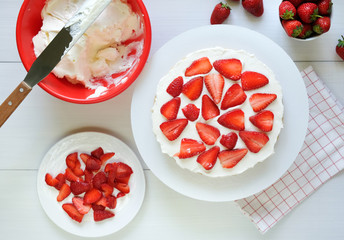 Making cake with strawberry and cream background. Top view. Cooking ingredients. Mockup for menu, recipe or culinary classes.