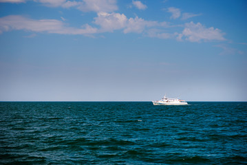 aerial top view yacht sailing in sea