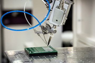 Desktop soldering robot used in soldering high-heat-sink applications such as a multilayer board...