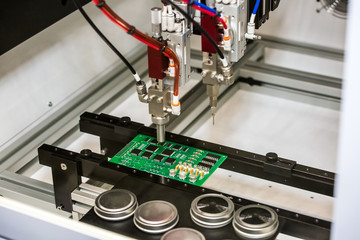 Flexible robotic conformal coating and dispensing system for selective coating potting, bead, and...