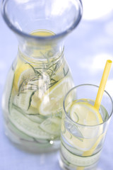 Detox water, fresh lemonade with ice, lemon, cucumber and rosemary