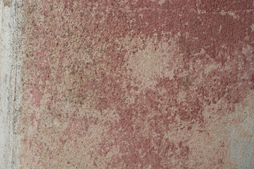 pink old weathered plaster wall background texture