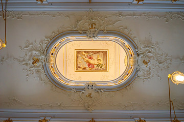 Historical Library with books, paintings and busts of German Poets in Weimar Germany / Rococo Style