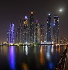 Fototapeta na wymiar Dubai marina skyscrapers panorama during night hours