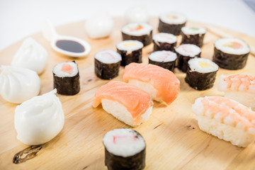 japanese food type sushi on wooden table with white background
