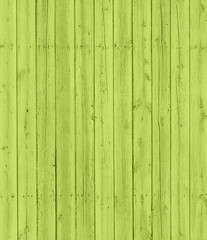 Fototapeta na wymiar Green wooden wall with vertical planks