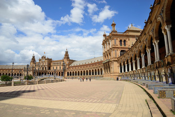 Fototapeta na wymiar Seville, Spain - May 25, 2018: Plaza de España with the building of the National Geographic Institute in the background.