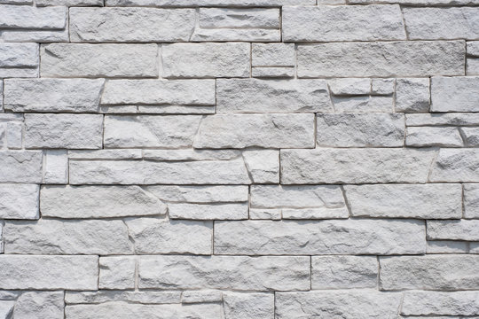 tiled natural stone wall background - granite stone texture