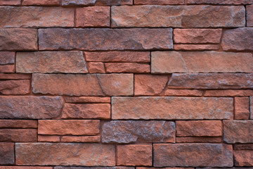 natural stone wall background - red tiled brick stones