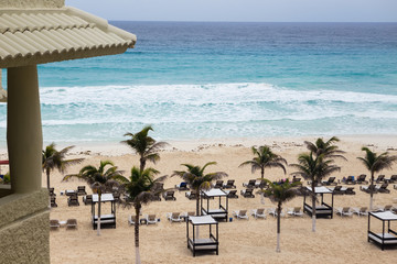 A view of beach beds in the shores of Cancun, Mexico.