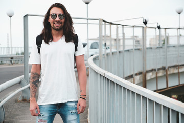 Smiling man hang out, walking in the city