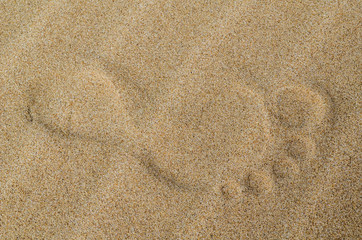 Fototapeta na wymiar footprint on sand