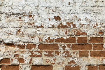 Red White Wall Texture. Brickwall Backdrop. White Red Stonewall Surface. Vintage Brickwork Structure With Peeled Plaster.