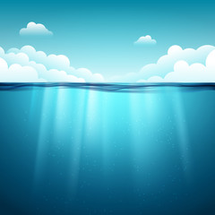 Underwater ocean surface. Blue water background. Clean nature sea underwater backdrop with sky