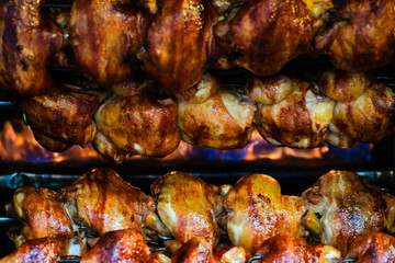 Rotating chicken at street food