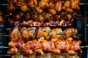 Rotating chicken at street food