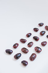Legumes on white background from top view