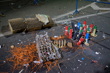 used fireworks rocket launcher on the ground