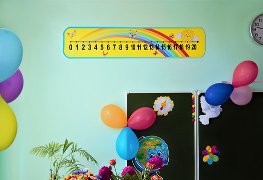 School, the last bell. The class and the classboard are decorated for the exam. Colorful background, selective focus. A place to copy.