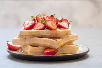 wholegrain waffles with strawberry and honey