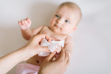 Mother Wiping Baby's hands