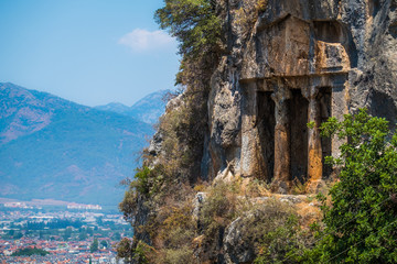 Amyntas rock tombs - 4th BC tombs carved in steep cliff. City of Fethiye, Turkey.