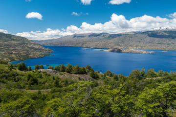 Fototapeta na wymiar Lake of Cochrane with clear blue water during sunny day. Patagonia, Chile