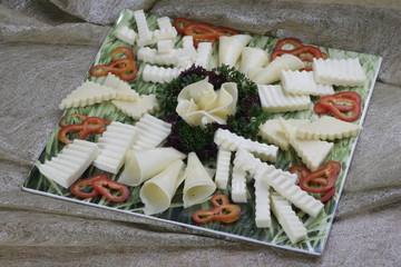 Various types of cheese next to each other