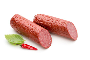 Salami smoked sausage, basil leaves on white background cutout.