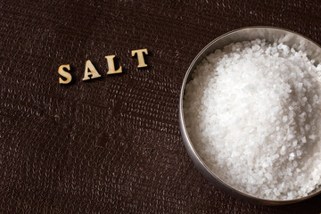 crystal salt in metal bowl