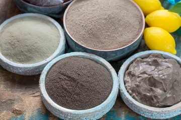 Ancient nature minerals, different types of clay used for skincare, spa treatments, face masks, gray, black, green and blue mud, close up