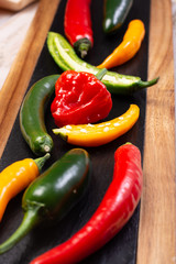 Colorful fresh hot Mexican chili peppers in assortment