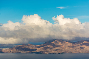 Fototapeta premium Aerial view of Lanzarote volcanic island, five minutes before landing Arrecife airport, Spain