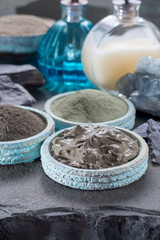 Ancient nature minerals, different types of clay used for skincare, spa treatments, face masks, gray, black, green and blue mud, close up