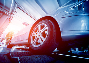 Automotive suspension test and brake test rolls in a auto repair service.