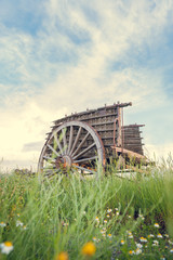 Old wooden trolley in the foreground isolated in its surroundings.